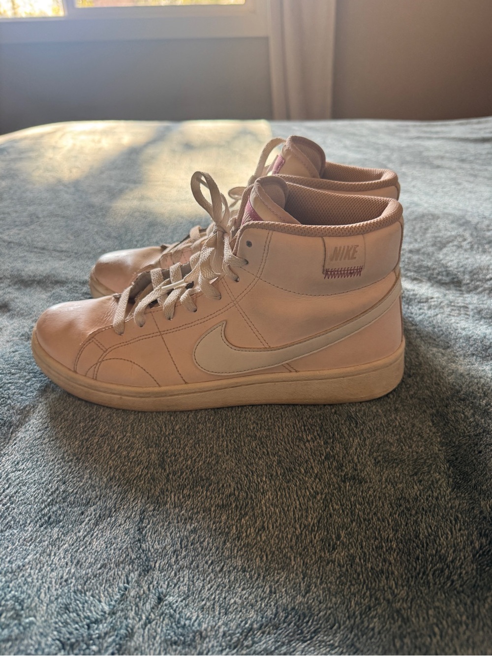Nike Women’s Light Pink High-Top Sneakers